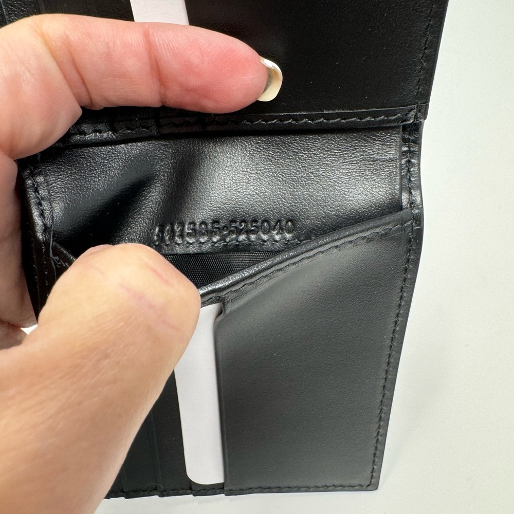Gucci Black Leather Gold Embossed GG Logo Bifold Wallet. $460 - Picture 6 of 6